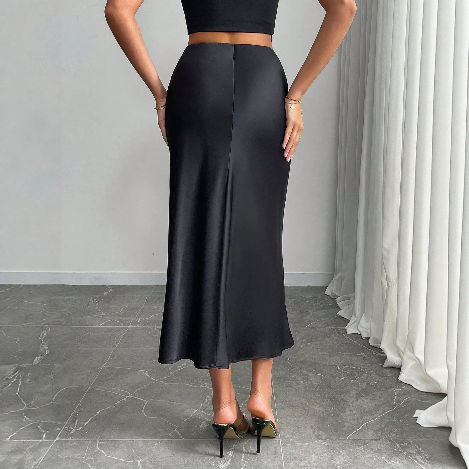Tailored fish tail half length skirt