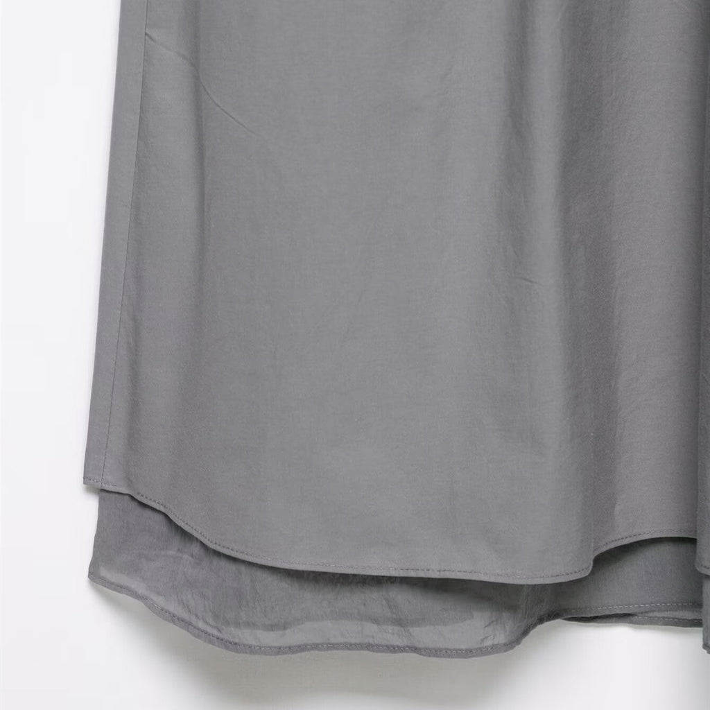 Splicing and layering decorative MIDI skirt